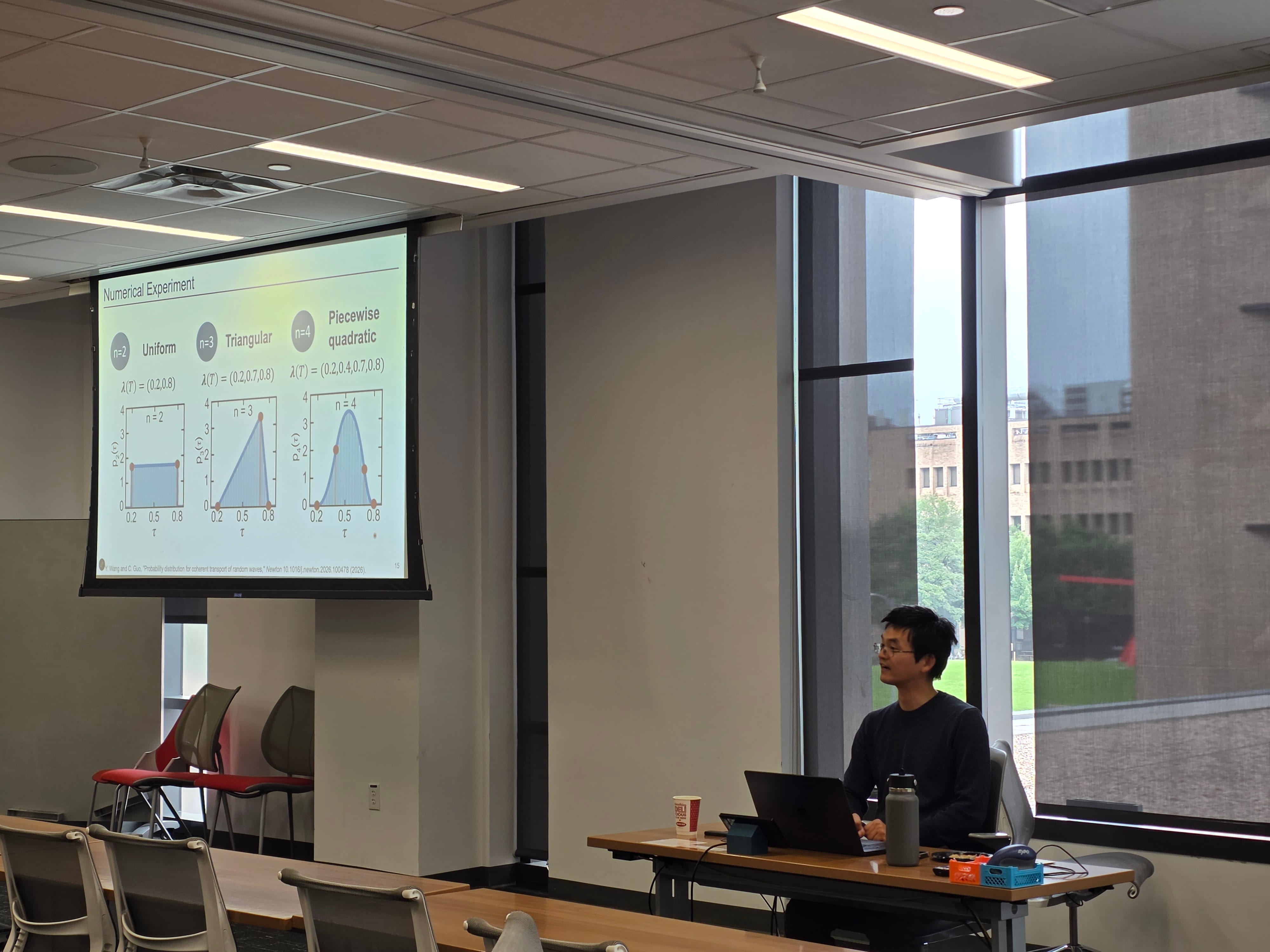 Dr. Guo giving a talk to his audience